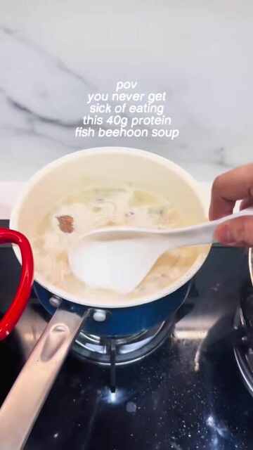 Fish soup simmering in a pot