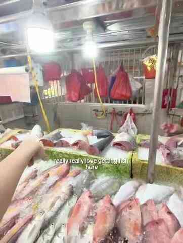 Fresh fish counter at Kebun Baru Market
